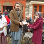 district nazim chitral distributes cheques among students maghfirat shah