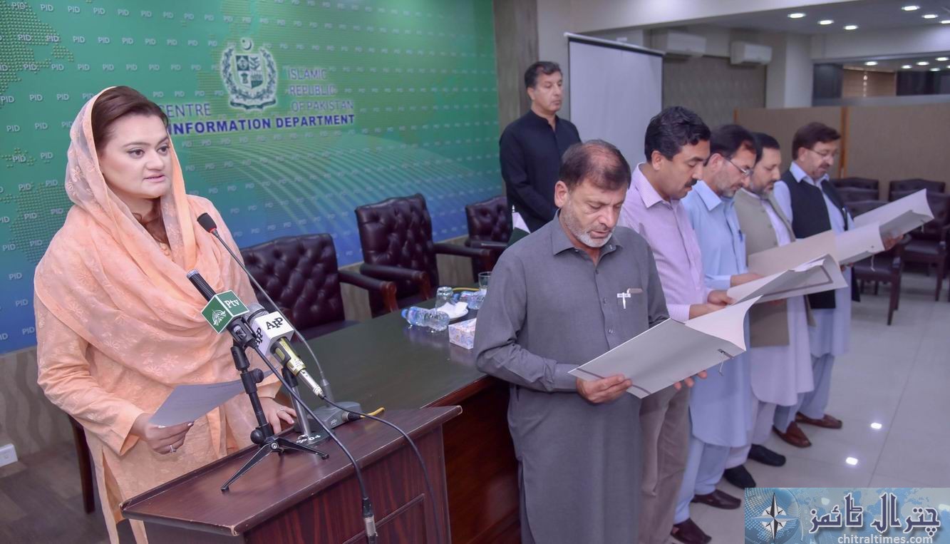 ISLAMABAD Minster of state for information administaring oath to the new elected officer bearers of Chitral Press Club at PID Media Center