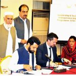 Senior Minsiter Local Govt signing MOU2