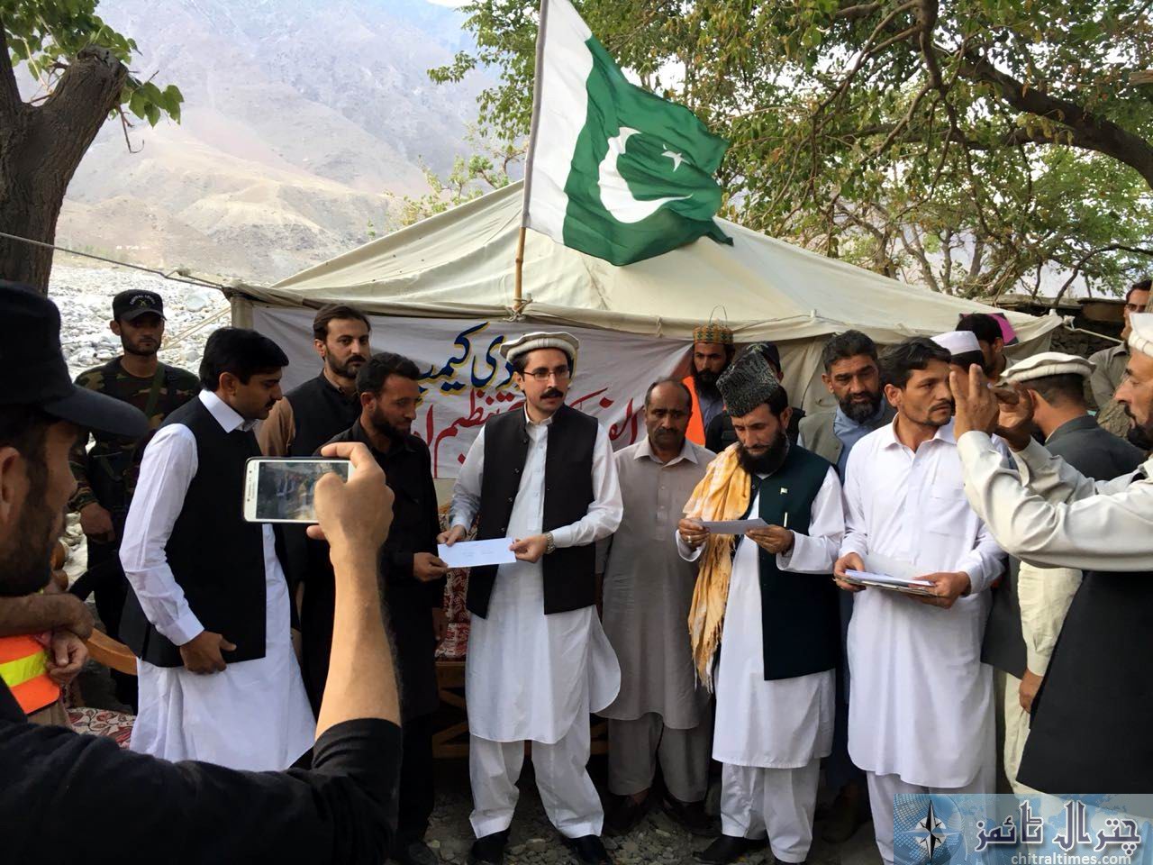 relief cheques distributed in Osiak drosh by DC Chitral 1