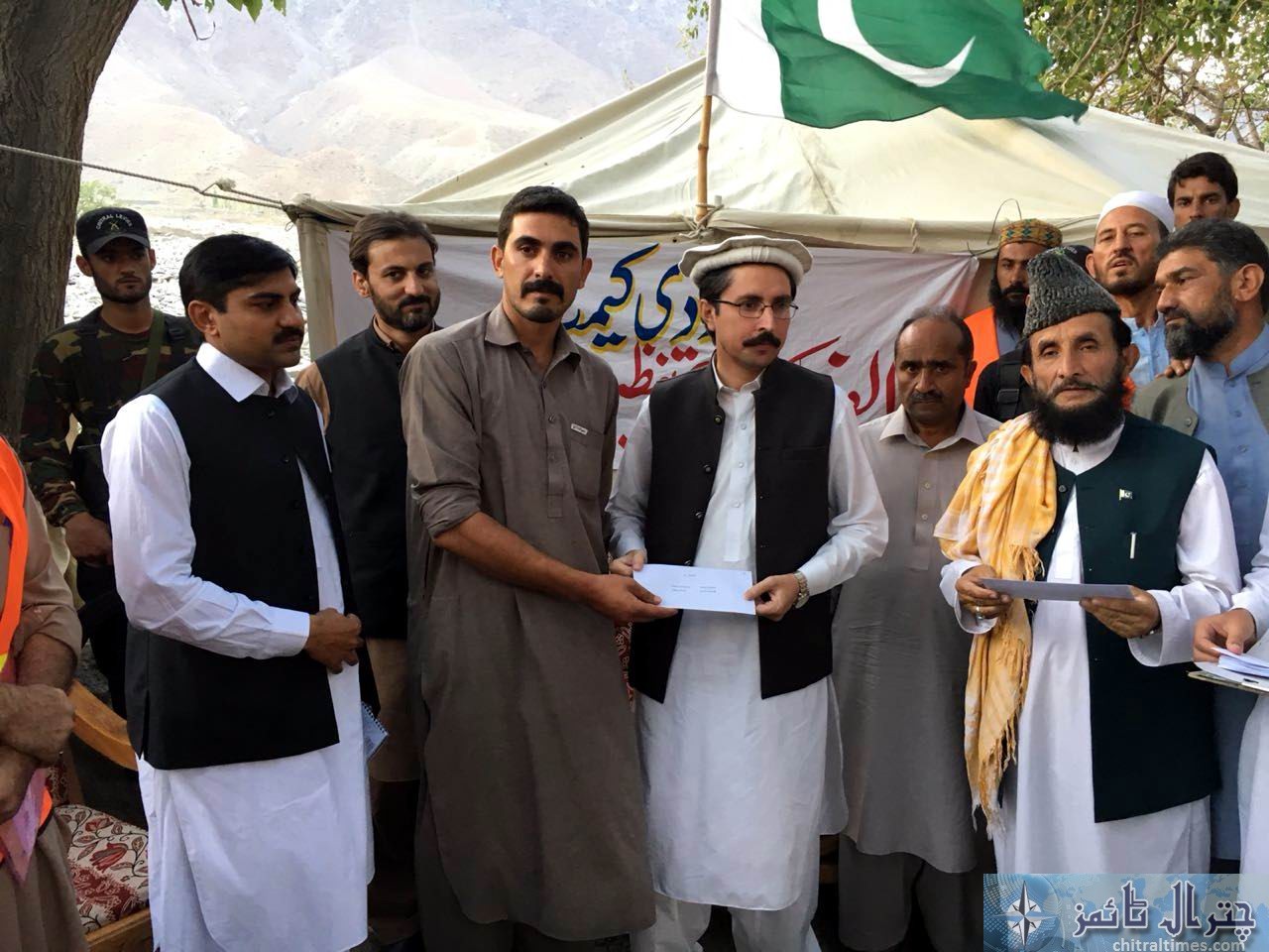 relief cheques distributed in Osiak drosh by DC Chitral 3