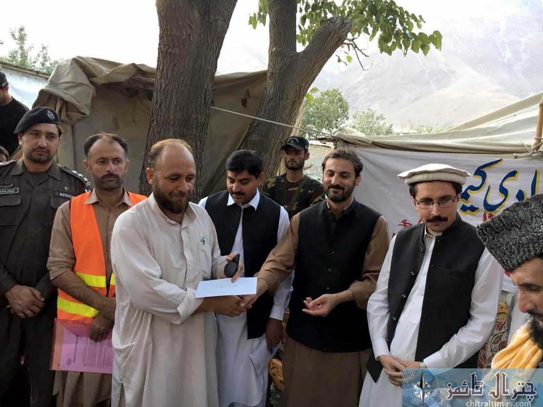 relief cheques distributed in Osiak drosh by DC Chitral 4