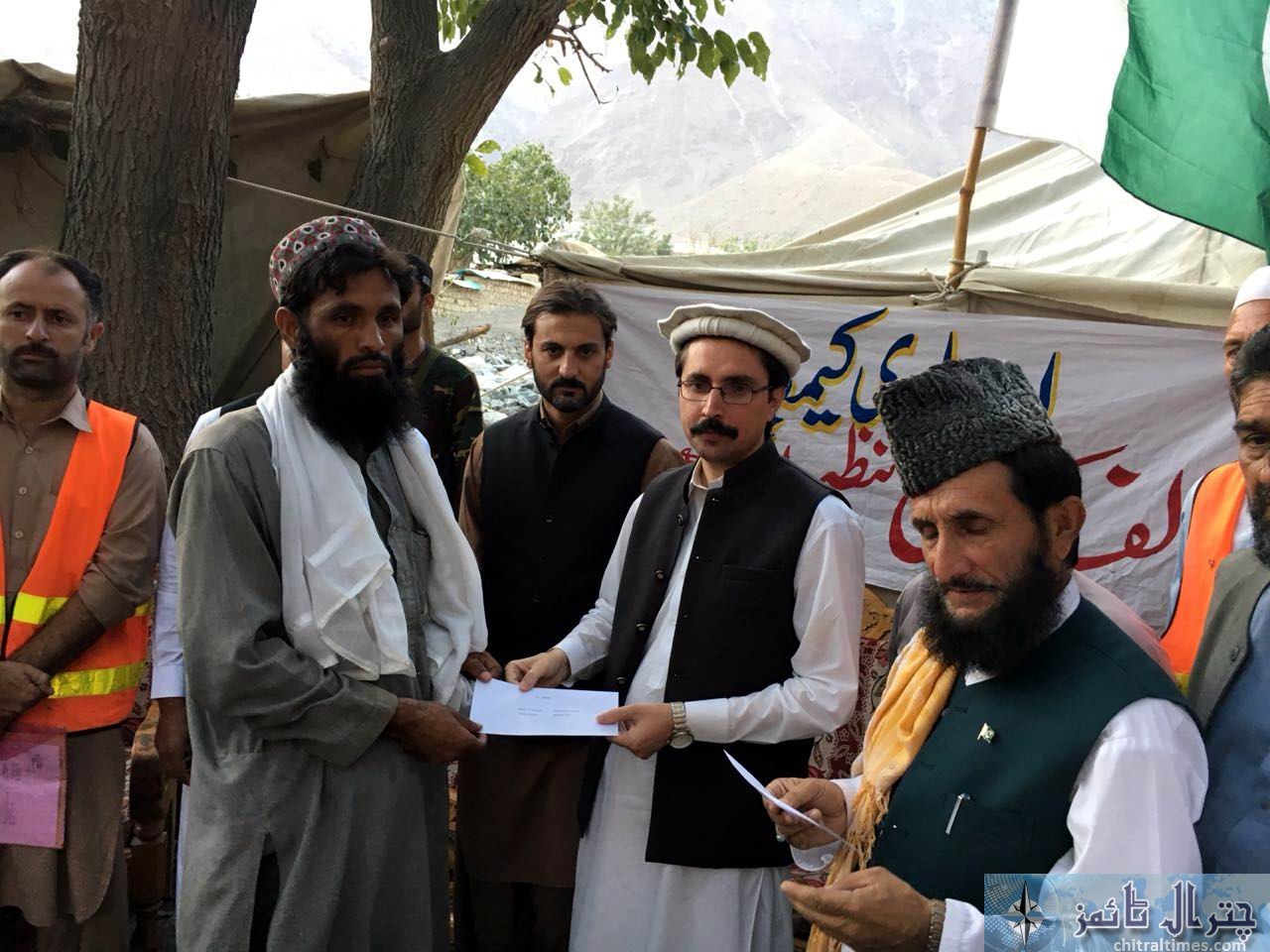 relief cheques distributed in Osiak drosh by DC Chitral 5