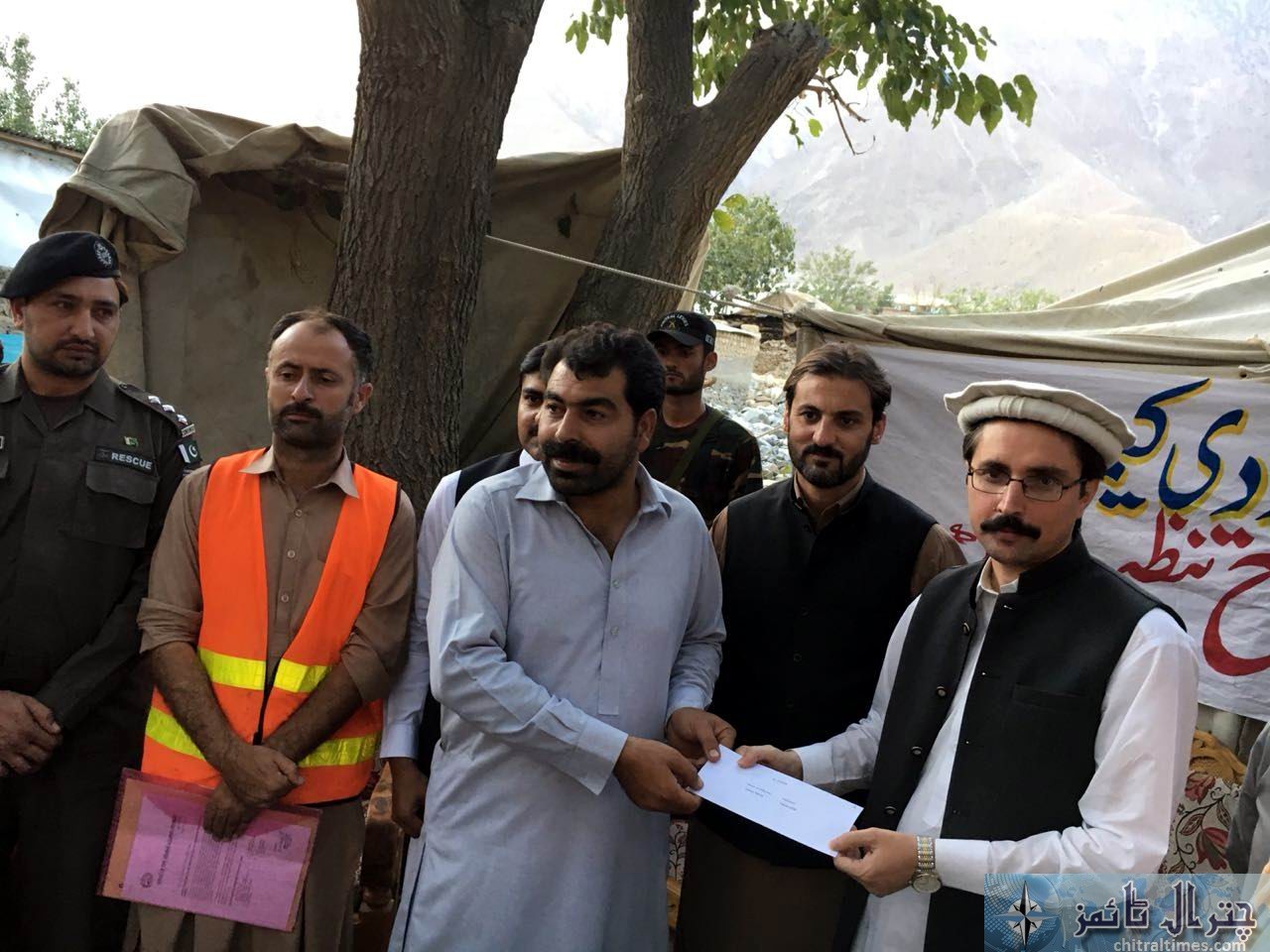 relief cheques distributed in Osiak drosh by DC Chitral 6