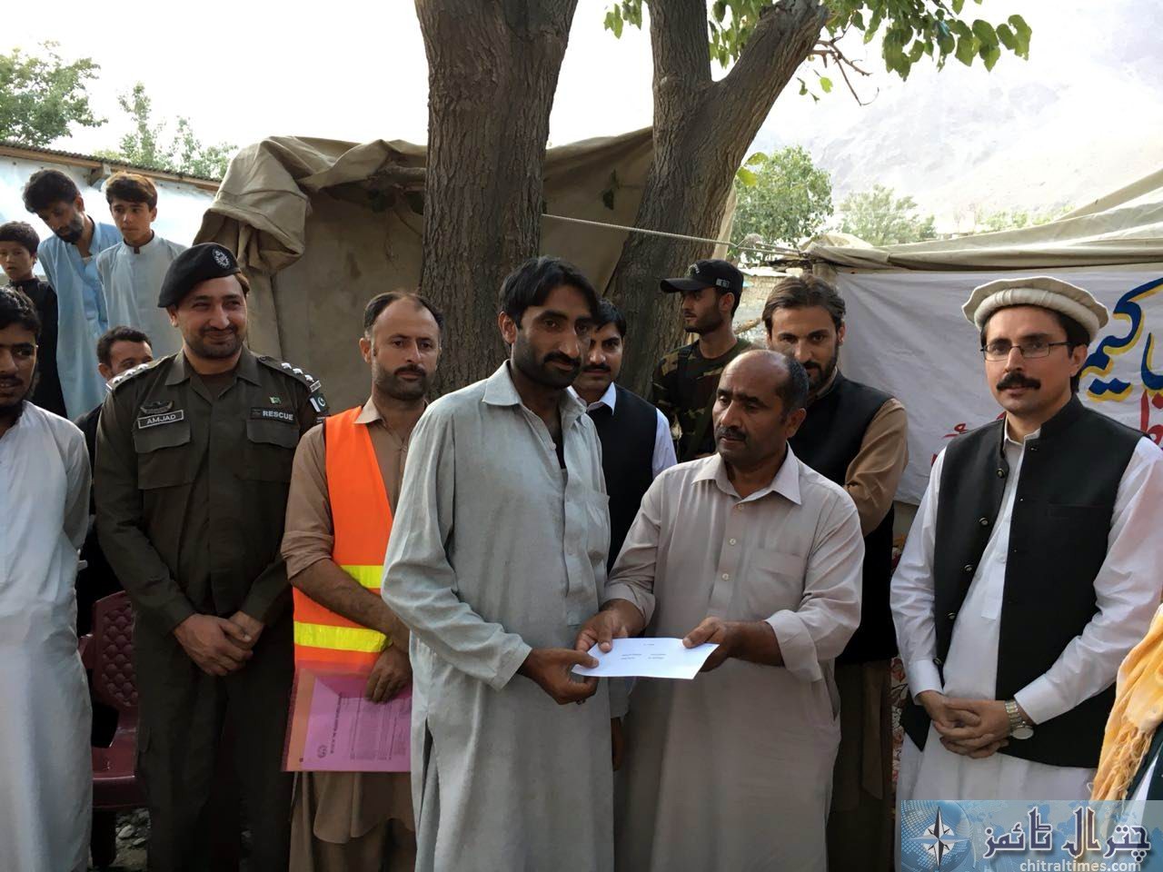 relief cheques distributed in Osiak drosh by DC Chitral 7