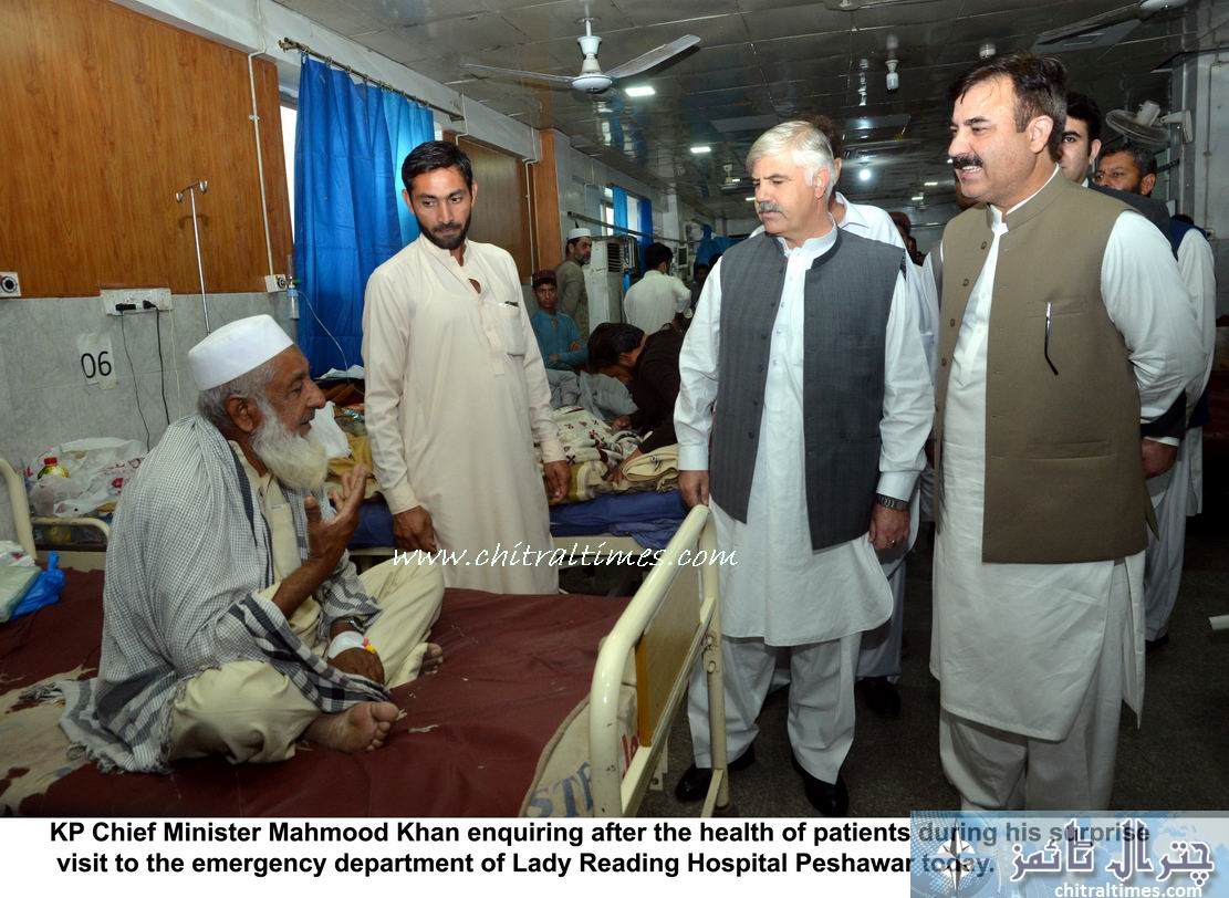 KP Chief Minister Mahmood Khan enquiring after the health of patients during his surprise visit to the emergency department of Lady Reading Hospital Peshawar