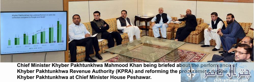 Chief Minister Khyber Pakhtunkhwa Mahmood Khan being briefed at Chief Minister House Peshawar