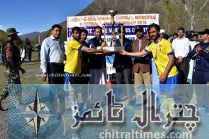 shohada memoral footbal tournamnet chitral final winner danin team receiving trophy