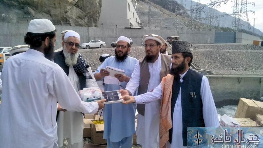 relief goods distributed on behalf of qari faizullah chitral in golan valley 1