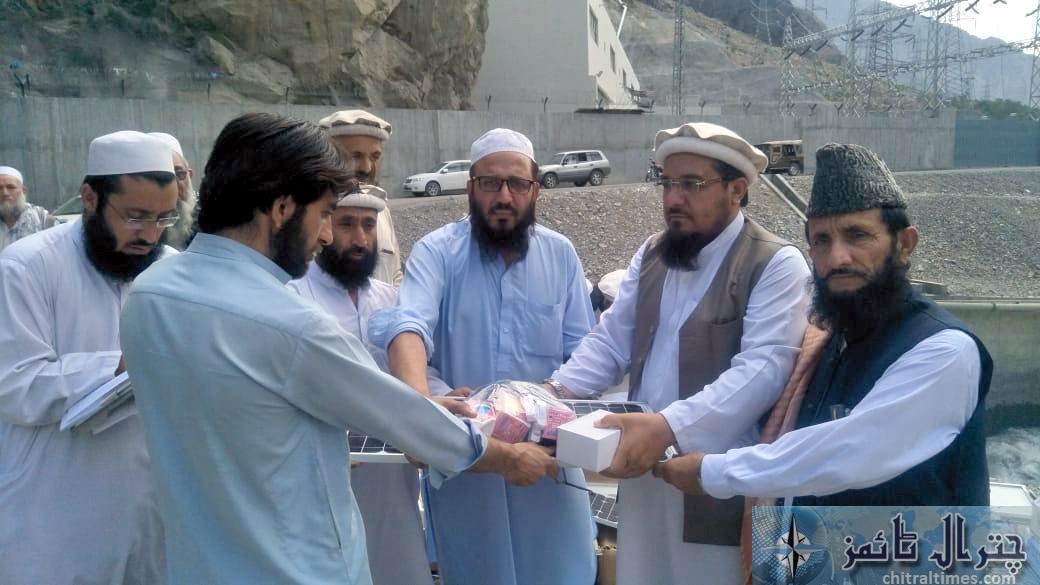 relief goods distributed on behalf of qari faizullah chitral in golan valley 2