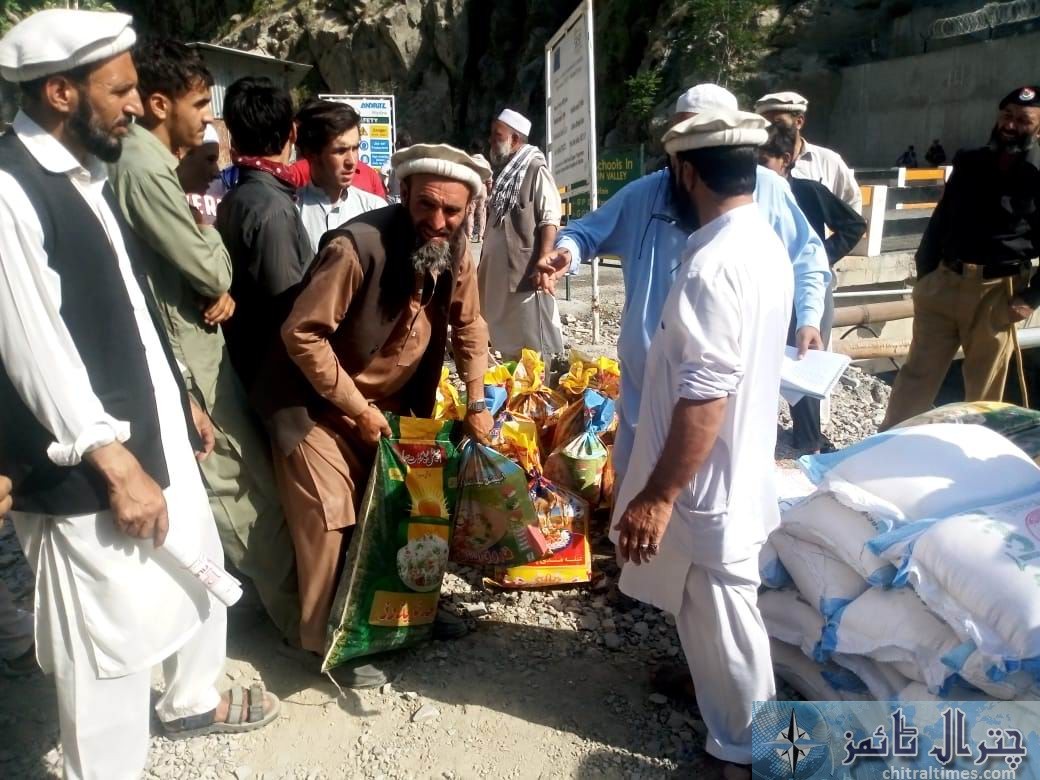 relief goods distributed on behalf of qari faizullah chitral in golan valley 4