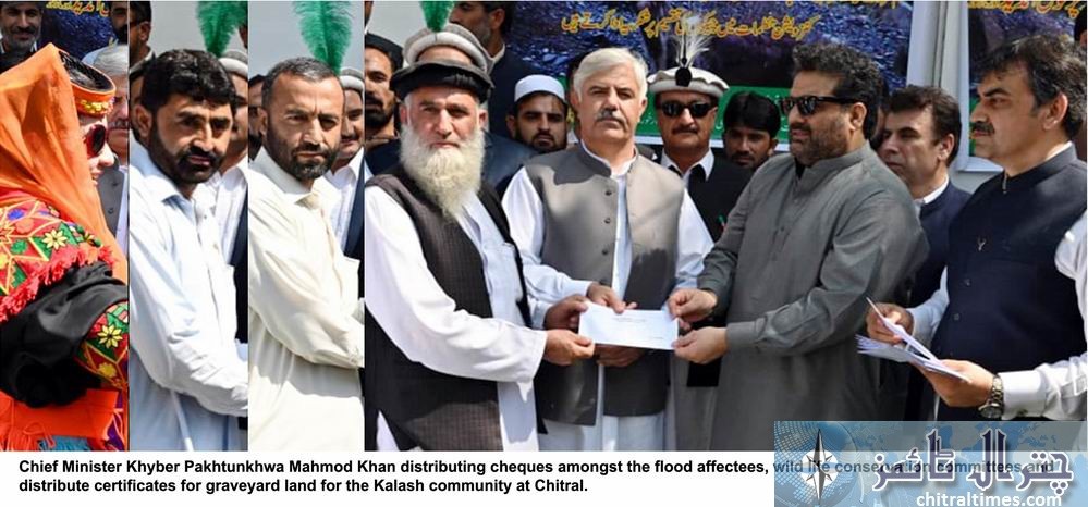 cm kp Mahmod Khan distributing cheques amongst the wild life conservation committees and graveyard land for the Kalash community at Chitral