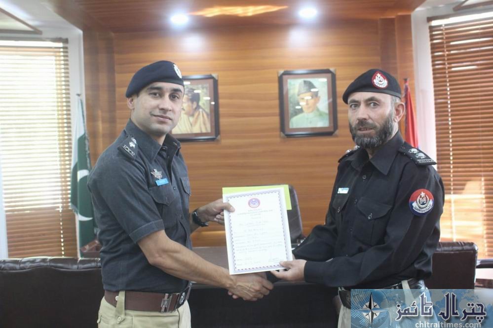 dpo chitral giving away certificates to police officials