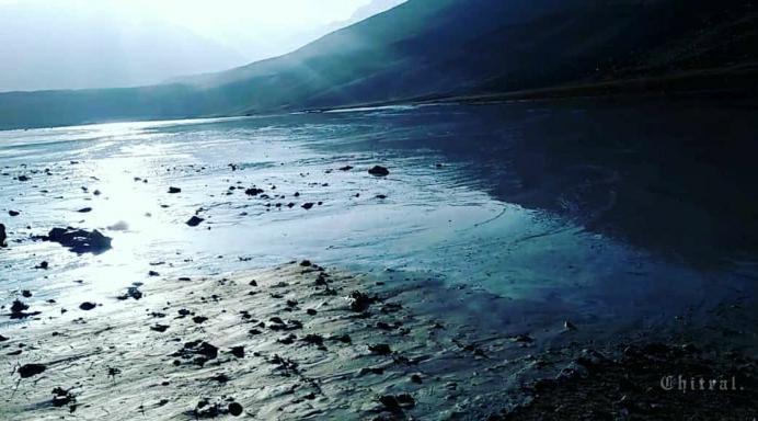 chitraltimes shandur flood washed away road upper chitral