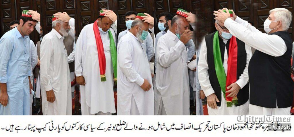 cm kp mahmood presenting caps to new joined pti
