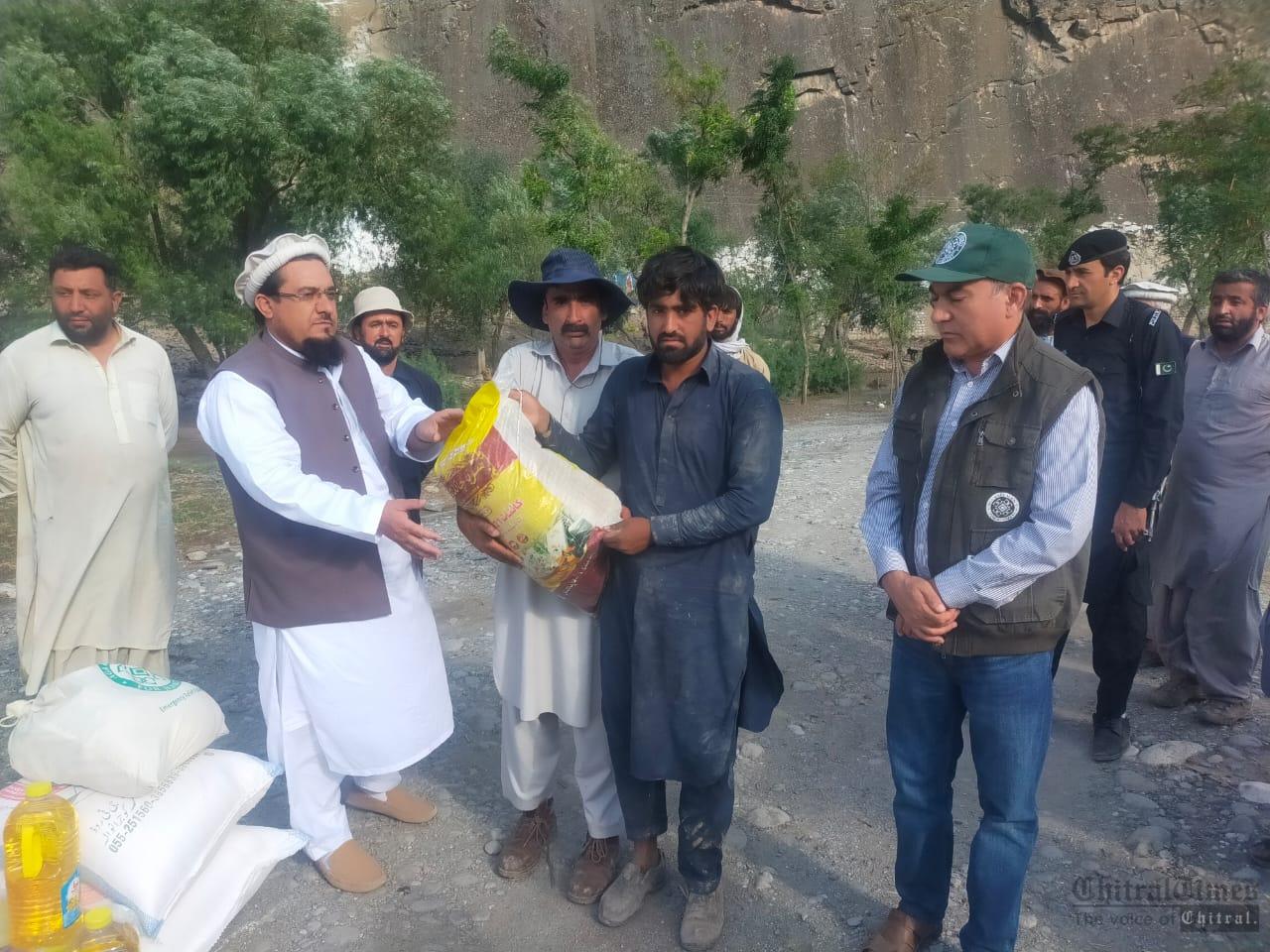 chitraltimes akah distributed relief package in syed abad mpa