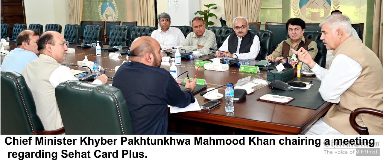 chitraltimes cm kp chairing meeting on sehat card plus
