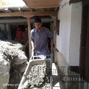 chitraltimes ismaili valunteers cleaning the flood effected houses in chuinj