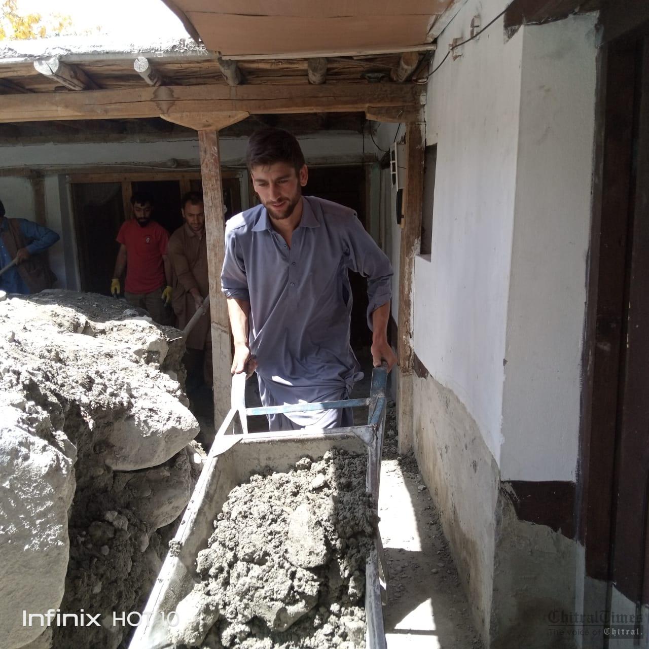 chitraltimes ismaili valunteers cleaning the flood effected houses in chuinj
