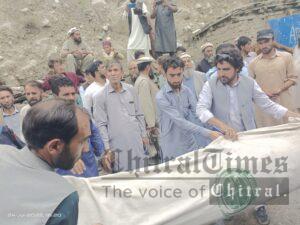chitraltimes relief goods distributed among flood victims of terich