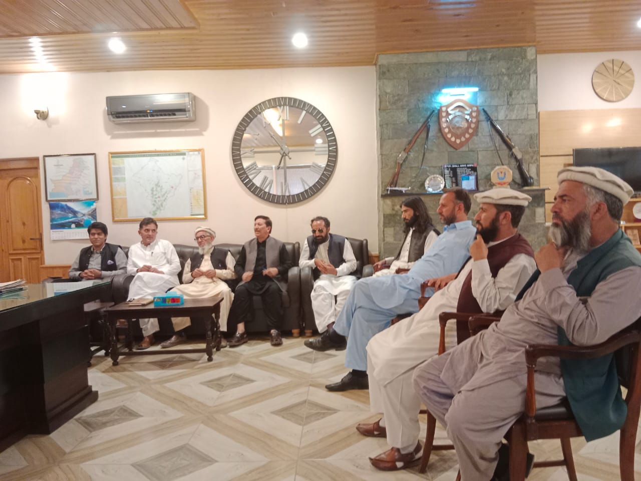 chitraltimes deputy commissioner lower chitral anwar ul haq chairing meeting political leaders