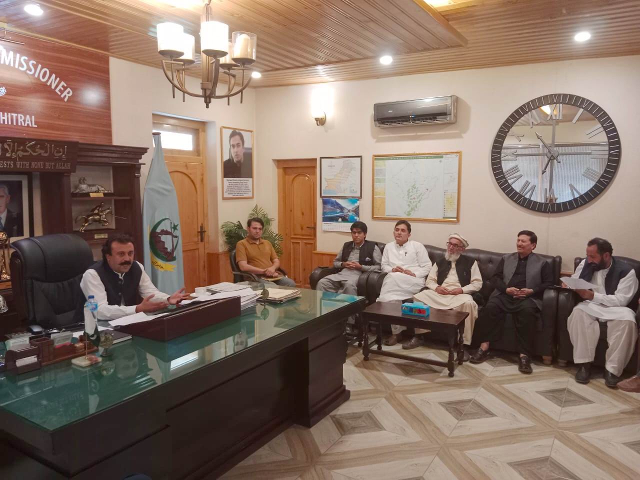 chitraltimes deputy commissioner lower chitral anwar ul haq chairing meeting
