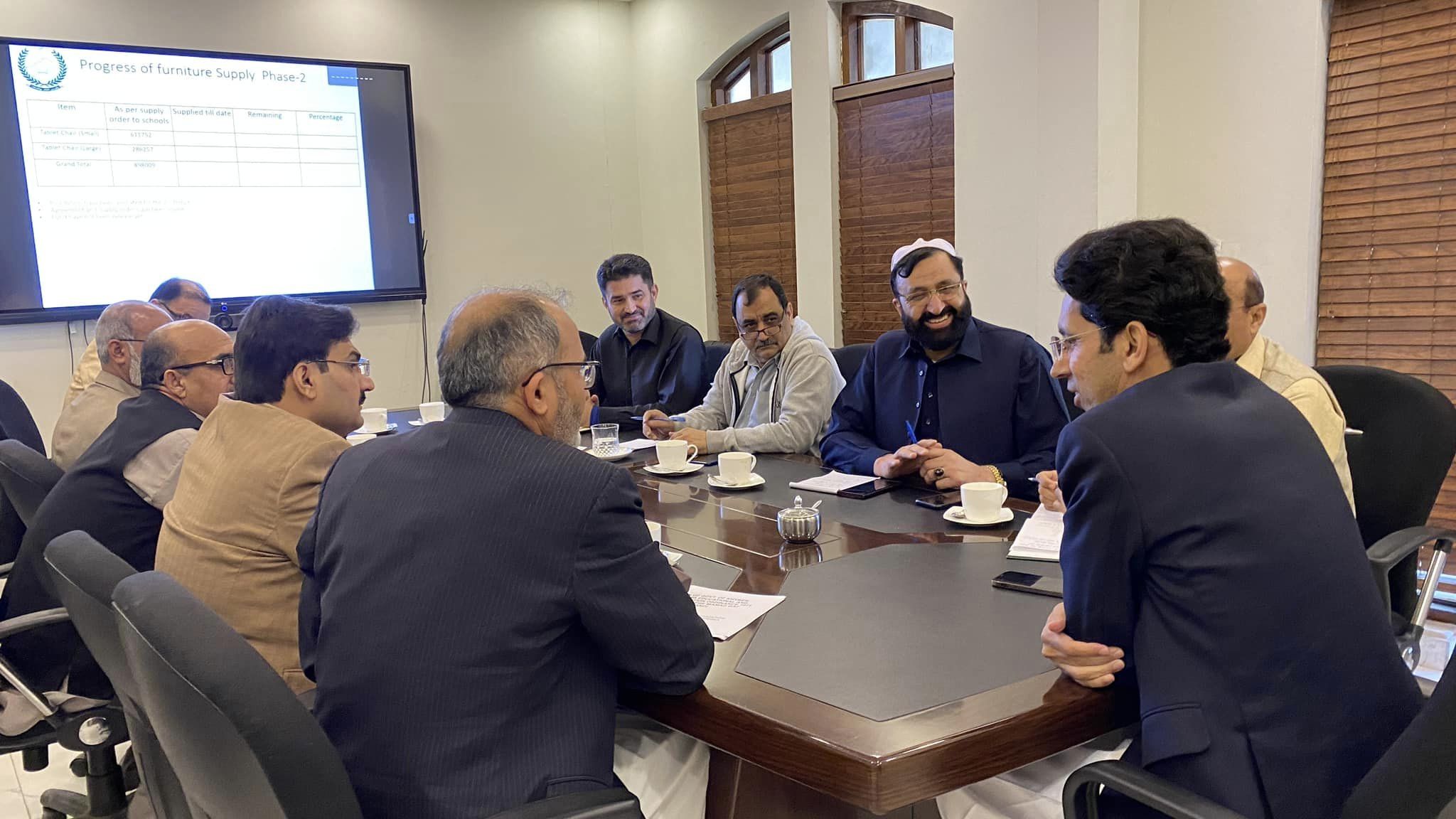 chitraltimes shahram khan tarakai chairing meeting