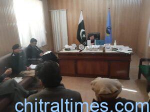 chitraltimes adc irfan chairing meeting block cnics