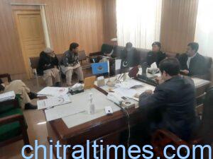 chitraltimes adc irfan chairing meeting block cnics2