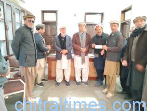 chitraltimes cheques distributed among reshun road affectees 2