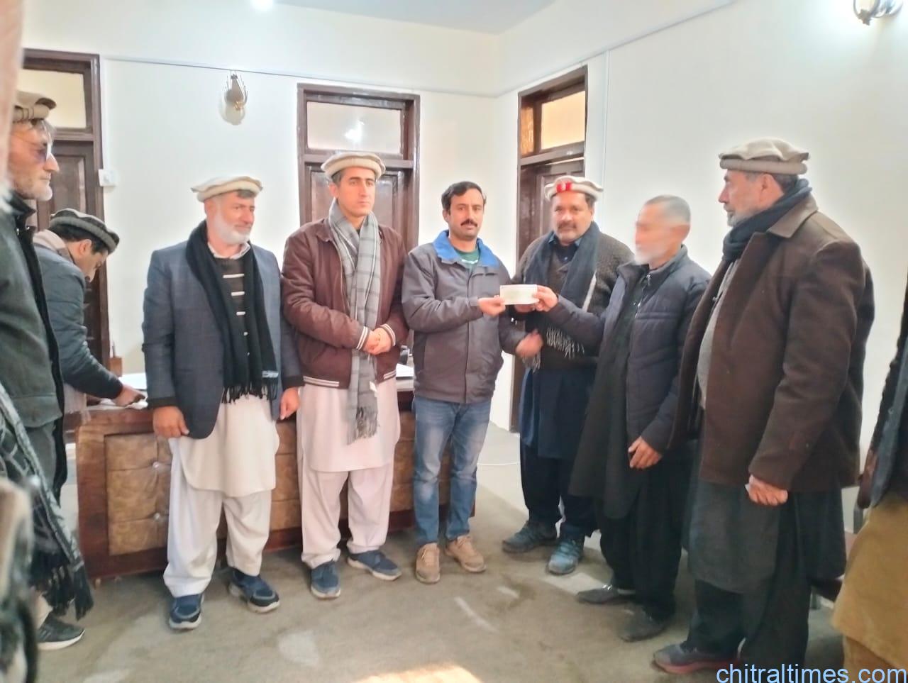chitraltimes cheques distributed among reshun road affectees 4