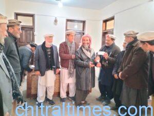 chitraltimes cheques distributed among reshun road affectees 5
