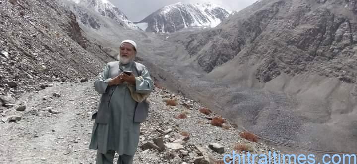 chitraltimes qari faizullah distributes steel sheets for flood affected people of chitral 1