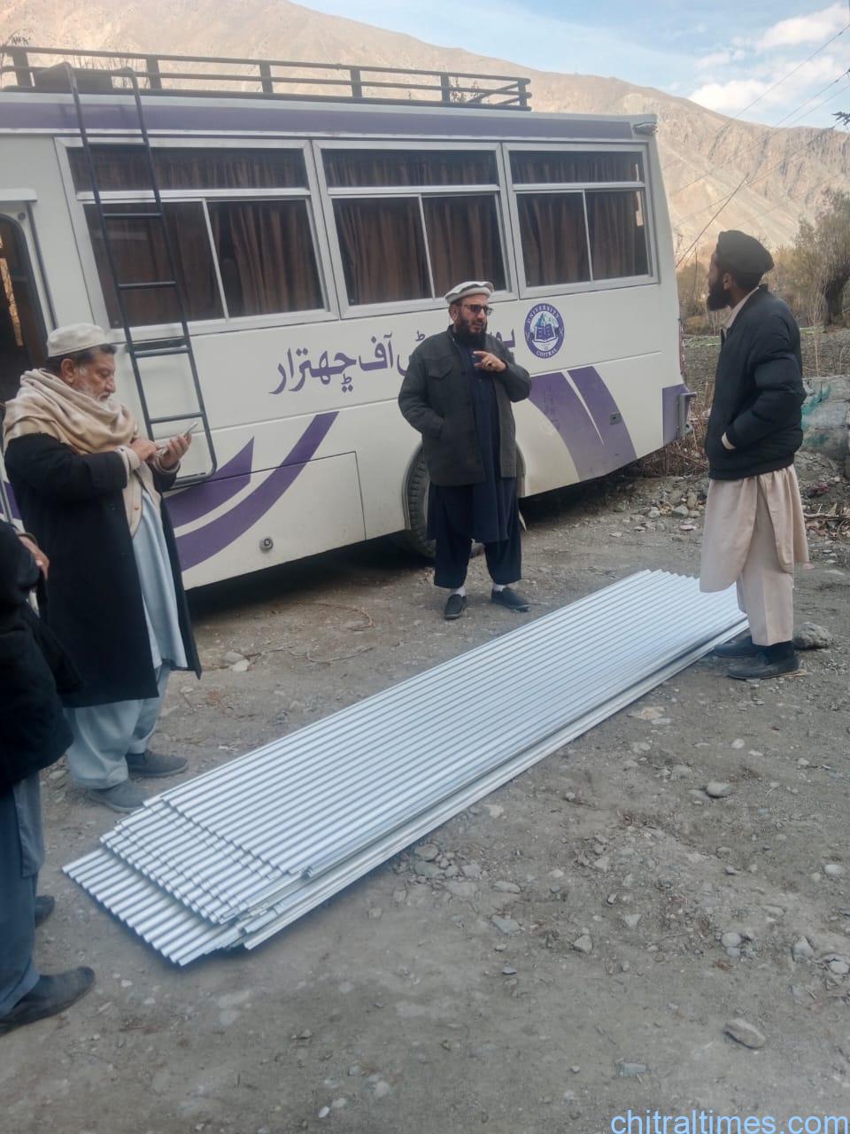 chitraltimes qari faizullah distributes steel sheets for flood affected people of chitral 4