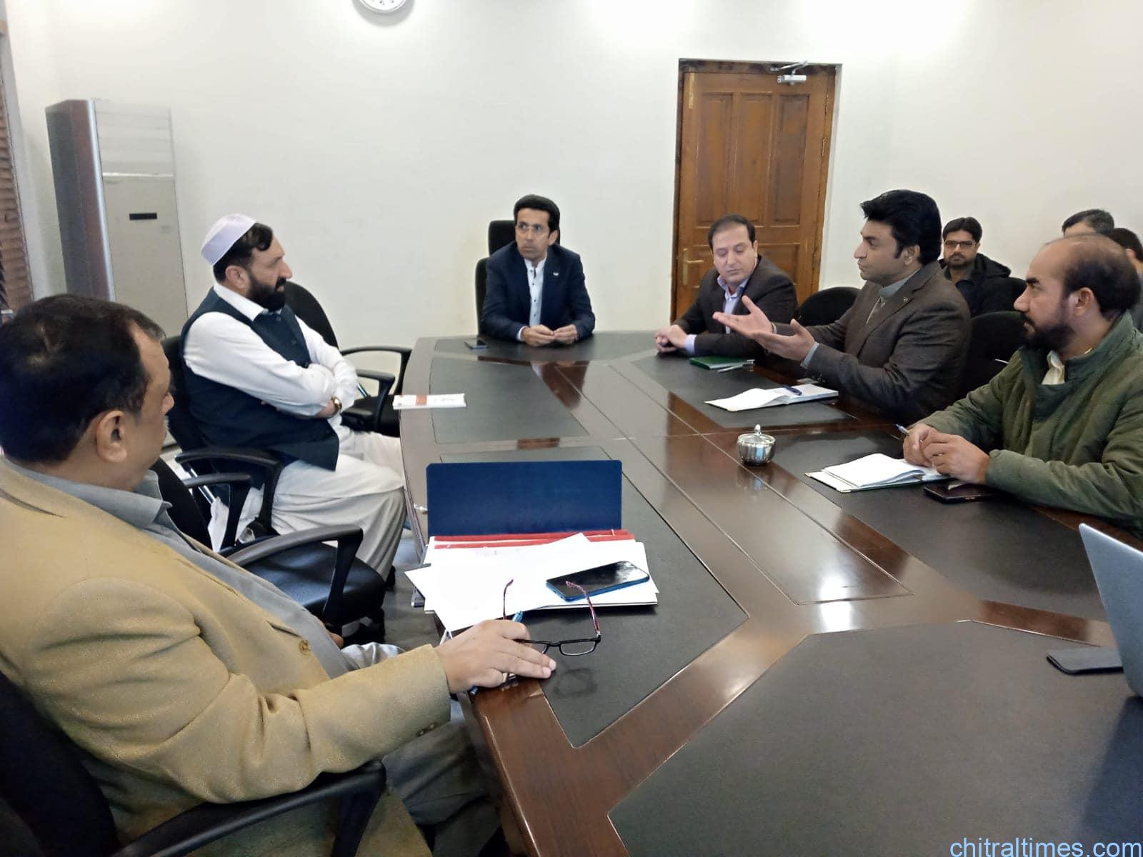 chitraltimes shahram tarakai chairing monitoring progress review meeting