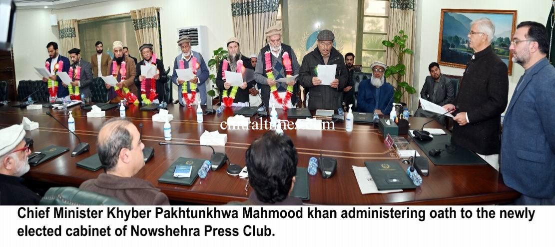 chitraltimes cm kp mahmood administering oath from Nowshehra press club cabinet