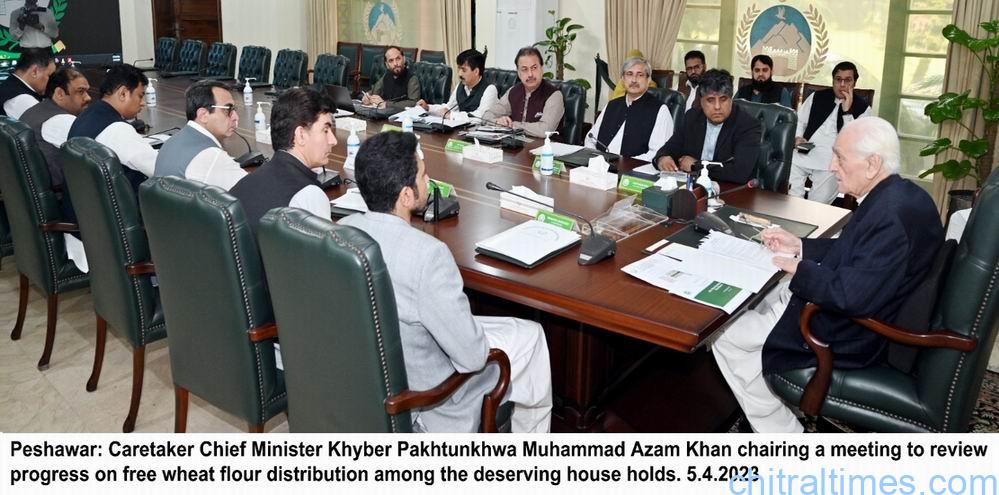 chitraltimes cm kp chairing meeting on wheat flour distribution