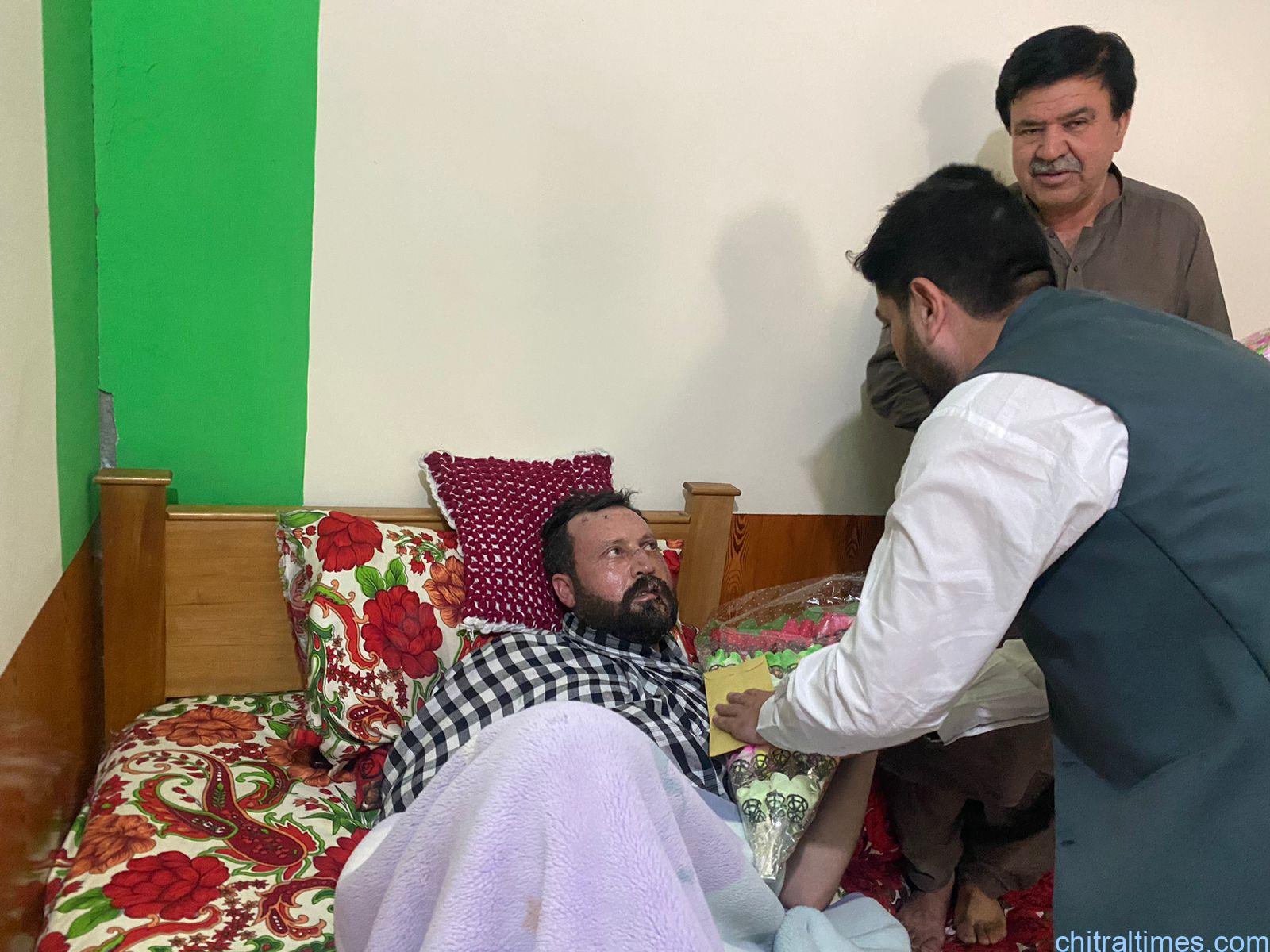 chitraltimes dc and dpo visit police jawan house who injured in swat kabal
