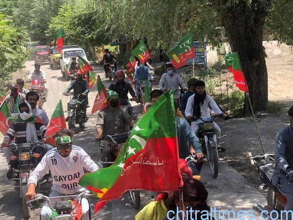 chitraltimes pti upper chitral rally flag march