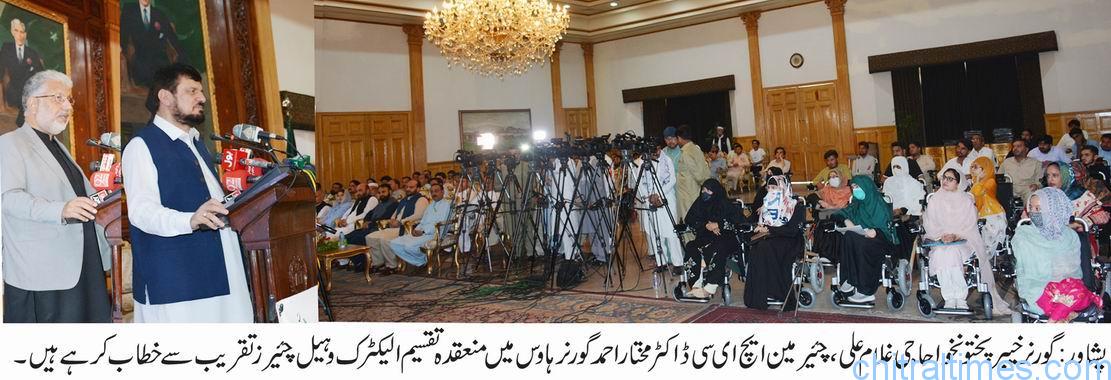 chitraltimes governor kp haji ghulam ali distributes electric wheel chairs among university students spech