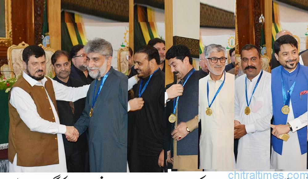 chitraltimes governor kp haji ghulam ali giving away medals to businessmen under fpcci