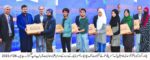 chitraltimes governor kp giving away laptop girls college abbottabad 3
