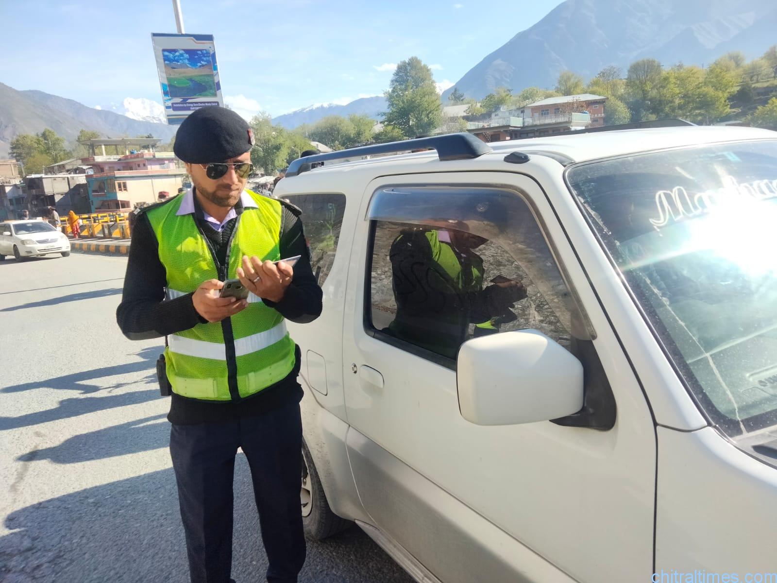 chitraltimes chitral lower trafic police campaign against black stikers2