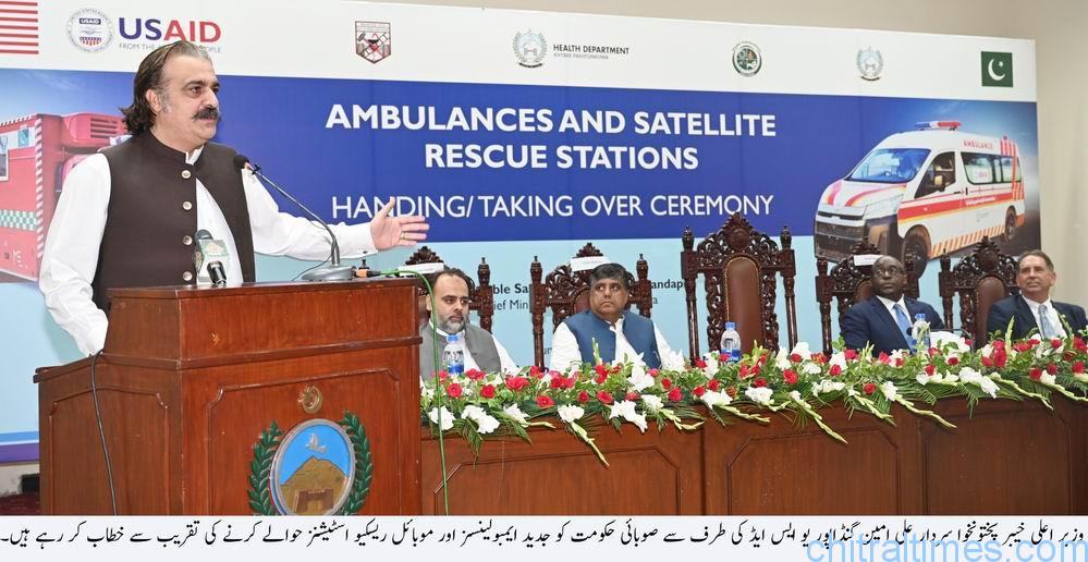 chitraltimes cm kp addressing a usaid program while receiving ambulances