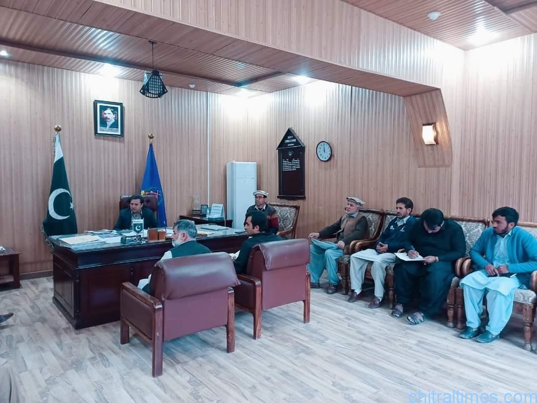 chitraltimes dc upper chitral m irfan chairing meeting with bazar union 2 1