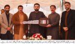 chitraltimes cm kp m sohail afridi giving away vehicles key to special education department 1