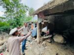 chitraltimes dc chitral lower visit flood hit area broze kol 2
