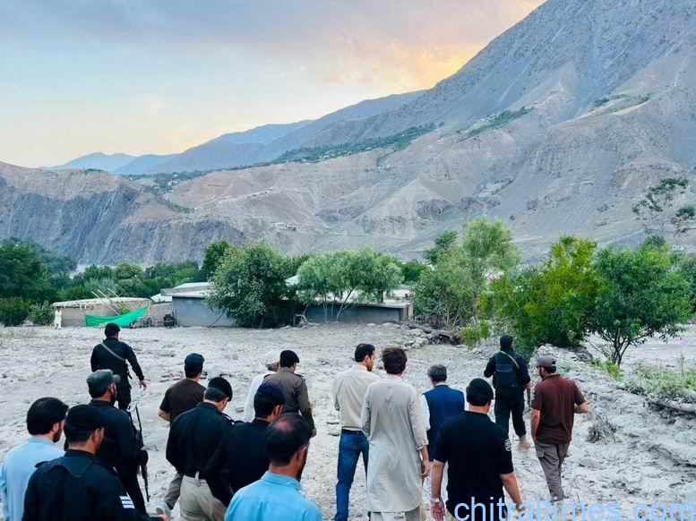 chitraltimes dc chitral lower visit flood hit area broze kol 4