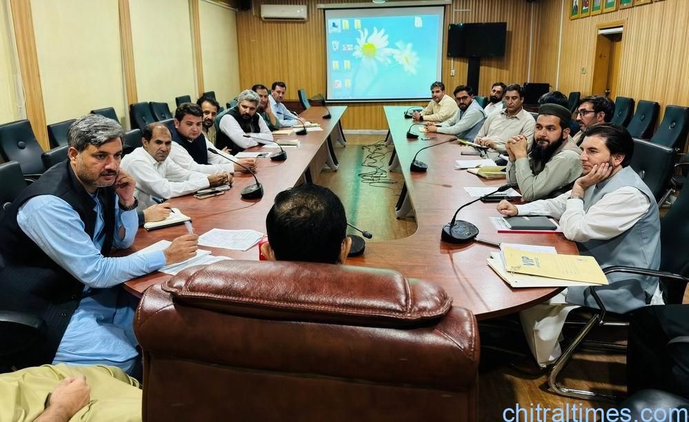 chitraltimes dc lower chitral chair meeting on play ground construction 2