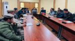 chitraltimes dc lower chitral raw hashim azeem chairing meeting on road projects
